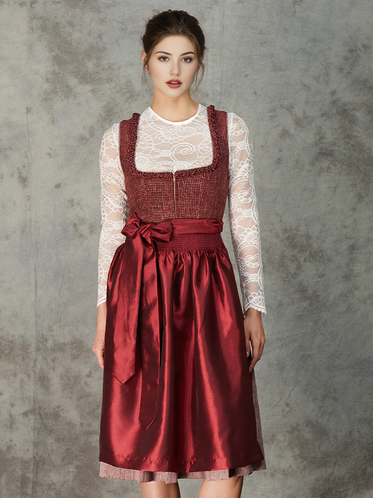 Moderne Dirndlbluse in Rot mit schwarzer Schürze