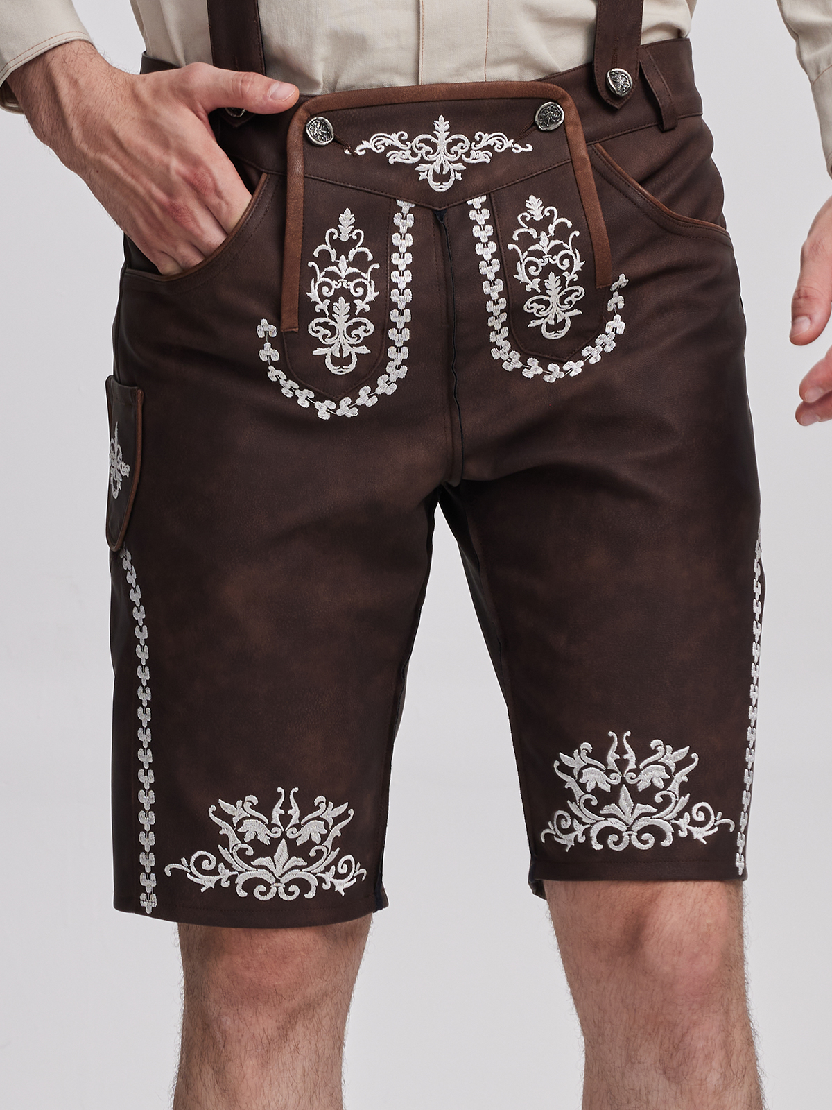 Braunes Leder-Dirndl mit Knöpfen